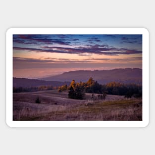Sunset over mountains Sticker